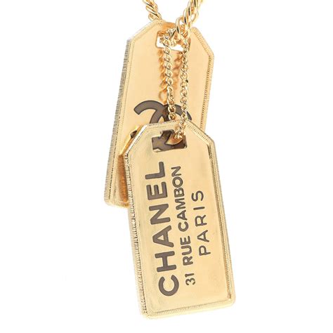 chanel dog toy uk|Chanel dog tag necklace.